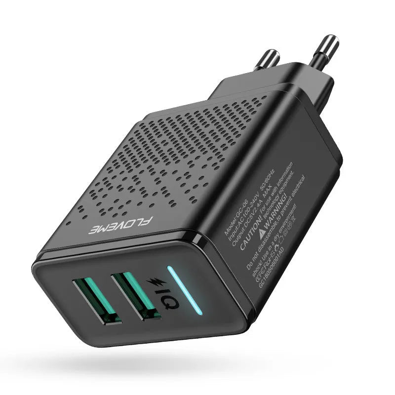 Dual port USB charger with EU plug in black or white colour charging two mobile devices