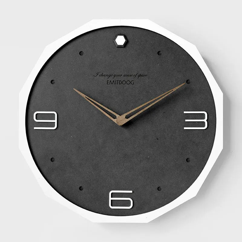 12-inch round Nordic minimalist wall clock with perforated metal face in a choice of four colours.