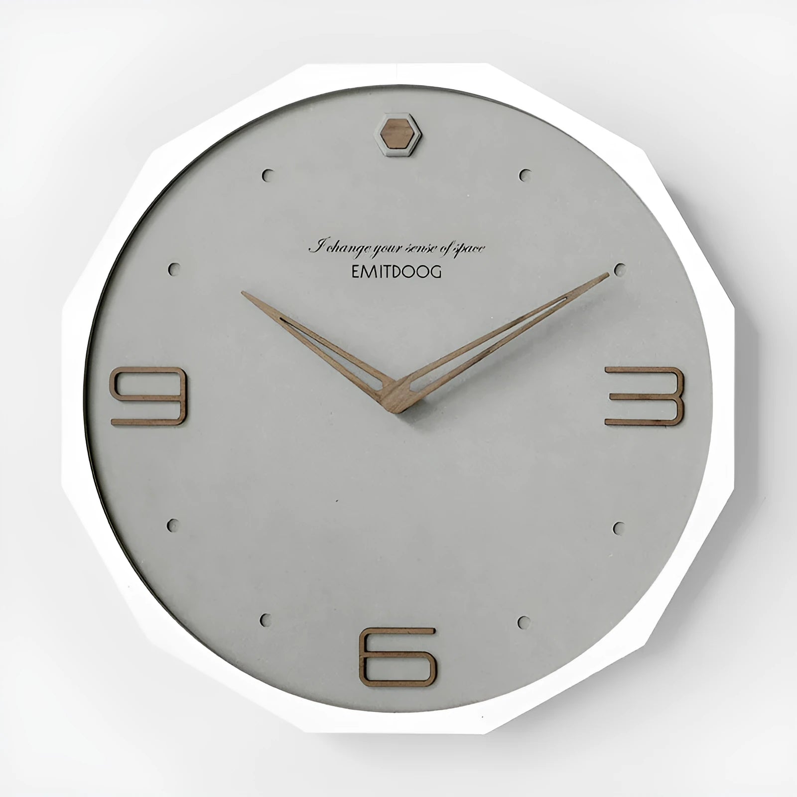 12-inch round Nordic minimalist wall clock with perforated metal face in a choice of four colours.