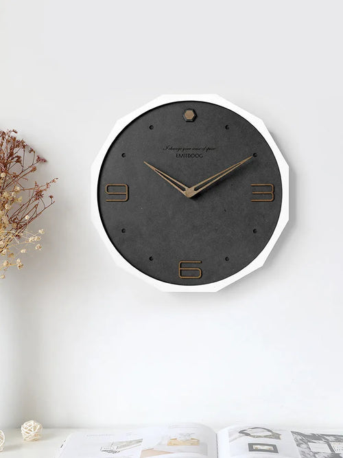 12-inch round Nordic minimalist wall clock with perforated metal face in a choice of four colours.