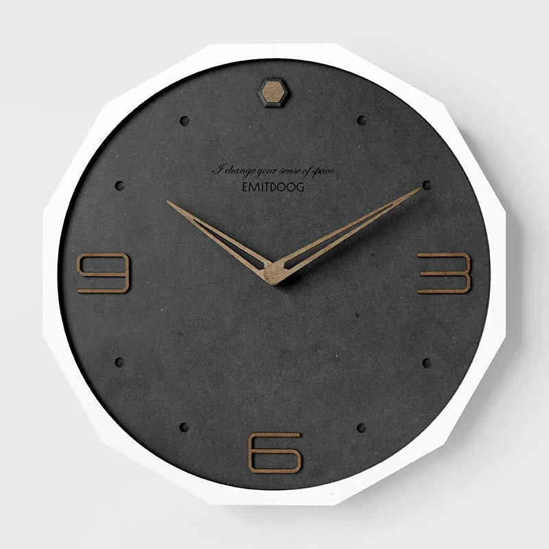 12-inch round Nordic minimalist wall clock with perforated metal face in a choice of four colours.