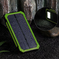 Orange three-proof solar power bank showing USB ports and solar panel, dimensions 161mm by 79mm.
