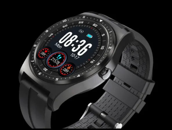 Black full circle touch screen fitness smart watch with silicone strap on a wrist.