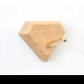 Beech wood and brass wall hook in round shape with 10kg load capacity