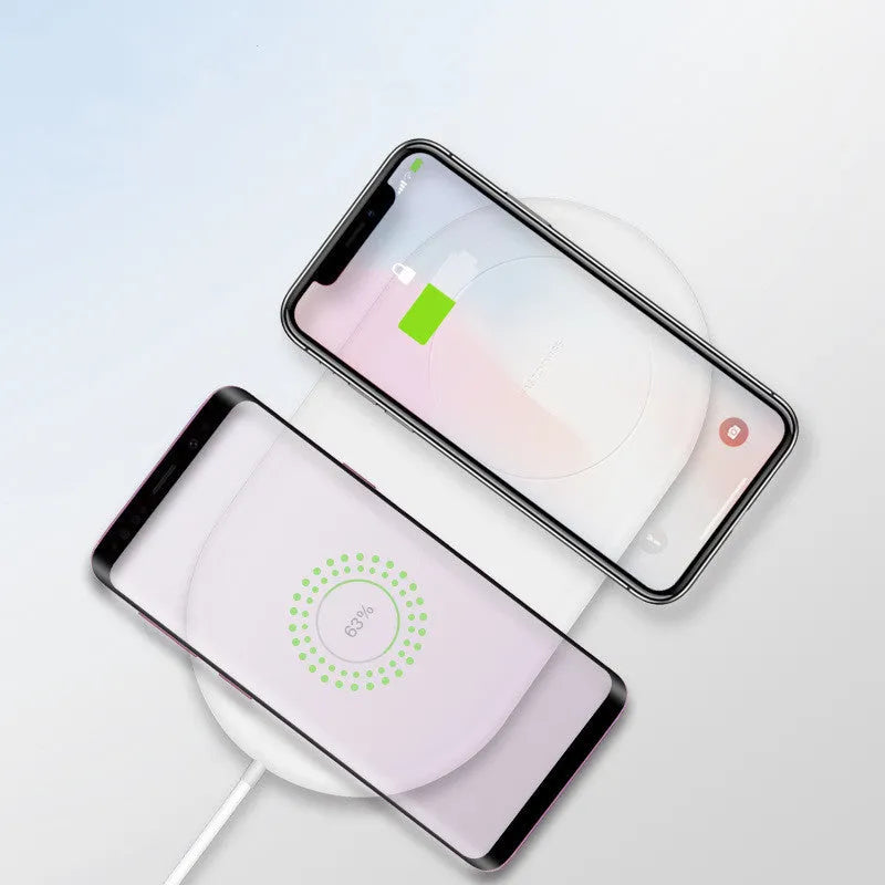 White dual wireless charger for two mobile phones with fast charging capability