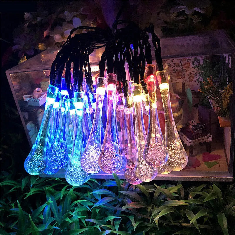 Solar-powered outdoor LED string lights with bubble drop pendants on 6.5 metre cable
