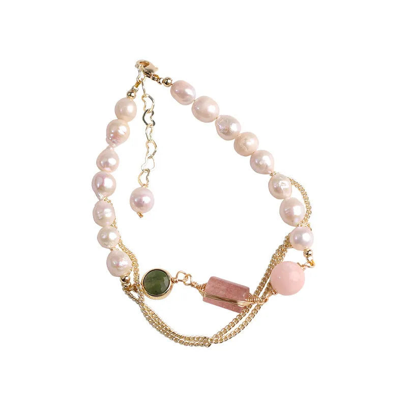 Women's pink bracelet with geometric strawberry crystal and natural freshwater pearls.