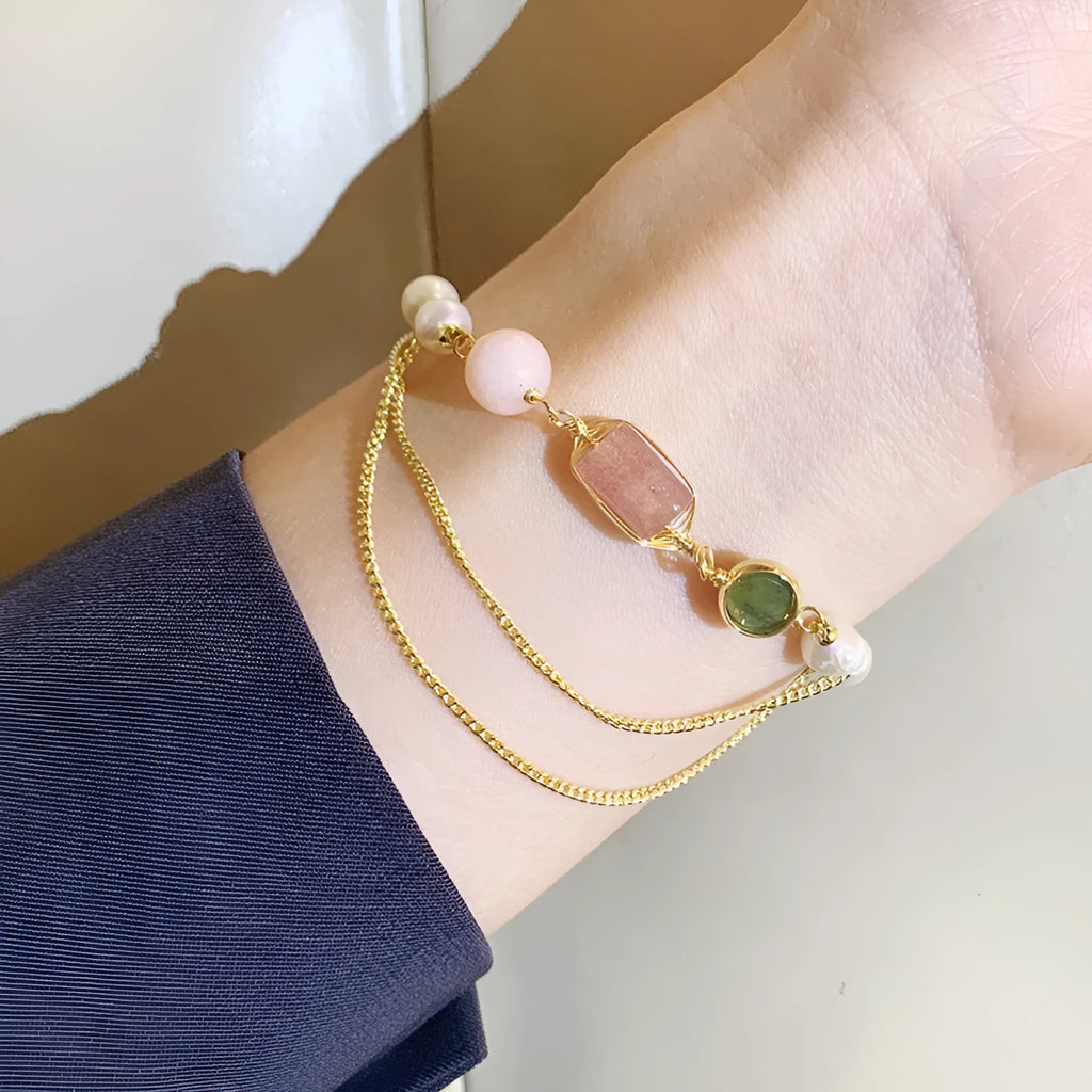 Women's pink bracelet with geometric strawberry crystal and natural freshwater pearls.