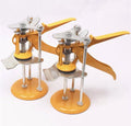 Metal tile raising positioner tool with adjustable height on a work surface.