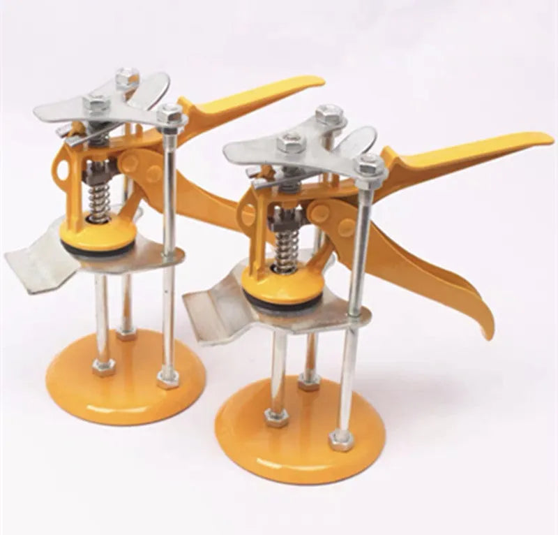 Metal tile raising positioner tool with adjustable height on a work surface.