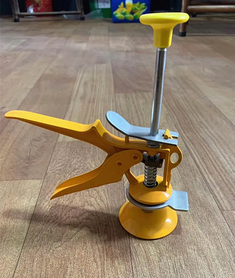 Metal tile raising positioner tool with adjustable height on a work surface.