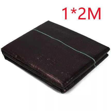 Black woven polyethylene weed control cloth laid on soil with size options shown