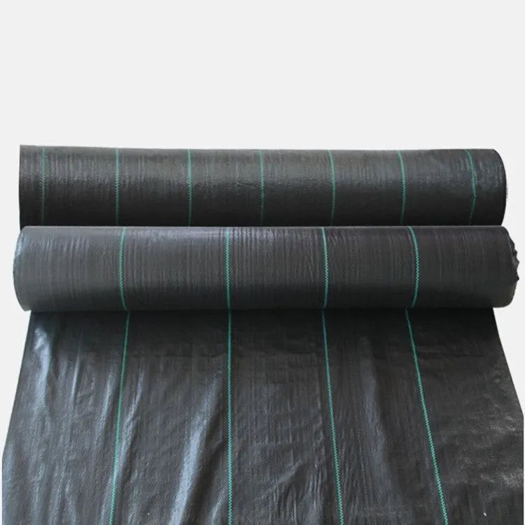 Black woven polyethylene weed control cloth laid on soil with size options shown