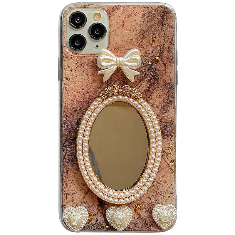 Brown marble pattern iPhone case with rhinestone bowknot and mirror finish.