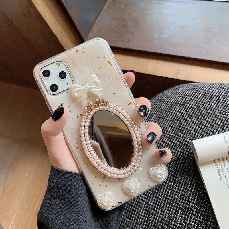 Brown marble pattern iPhone case with rhinestone bowknot and mirror finish.