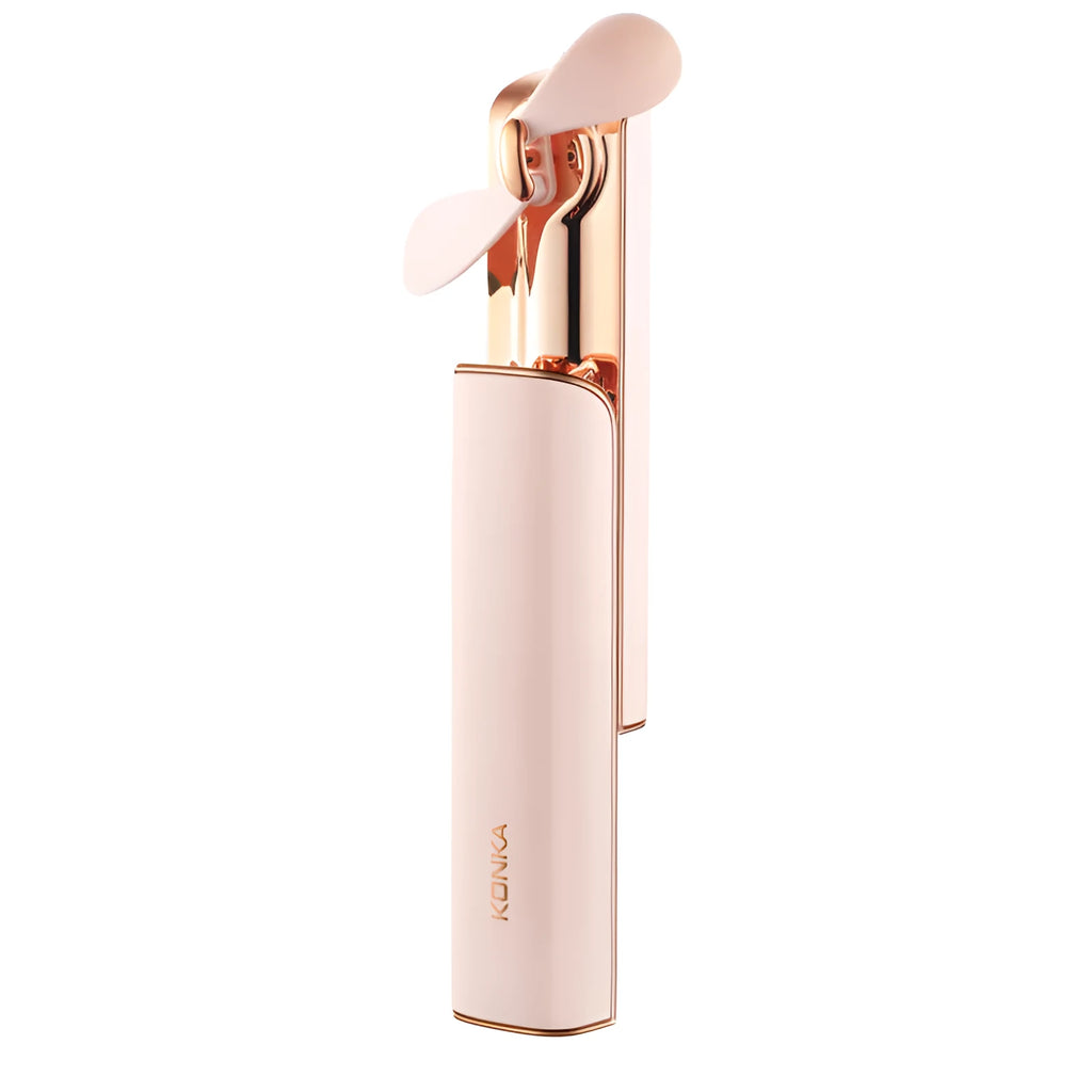 Pink handheld folding fan with USB port and mechanical control buttons on base.
