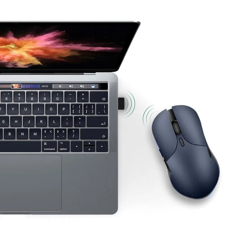 Blue Smart Voice Mouse with 2.4G wireless receiver and voice control button on a desk.