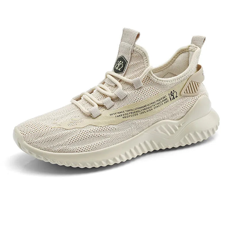 Men's low-top white mesh sports sneakers with rubber sole on a plain background