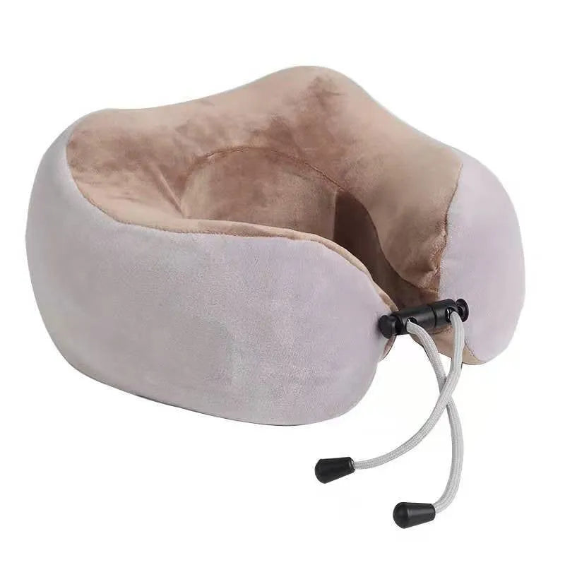 Brown U-shaped electric neck massage pillow with control buttons.