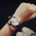 Electronic digital watch with blue light display showing numbers, available in black and white colour options
