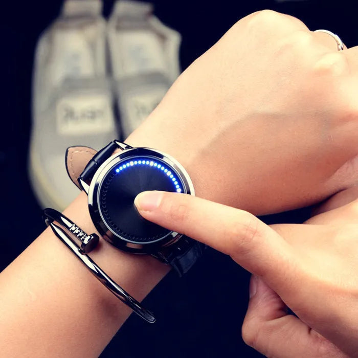Electronic digital watch with blue light display showing numbers, available in black and white colour options