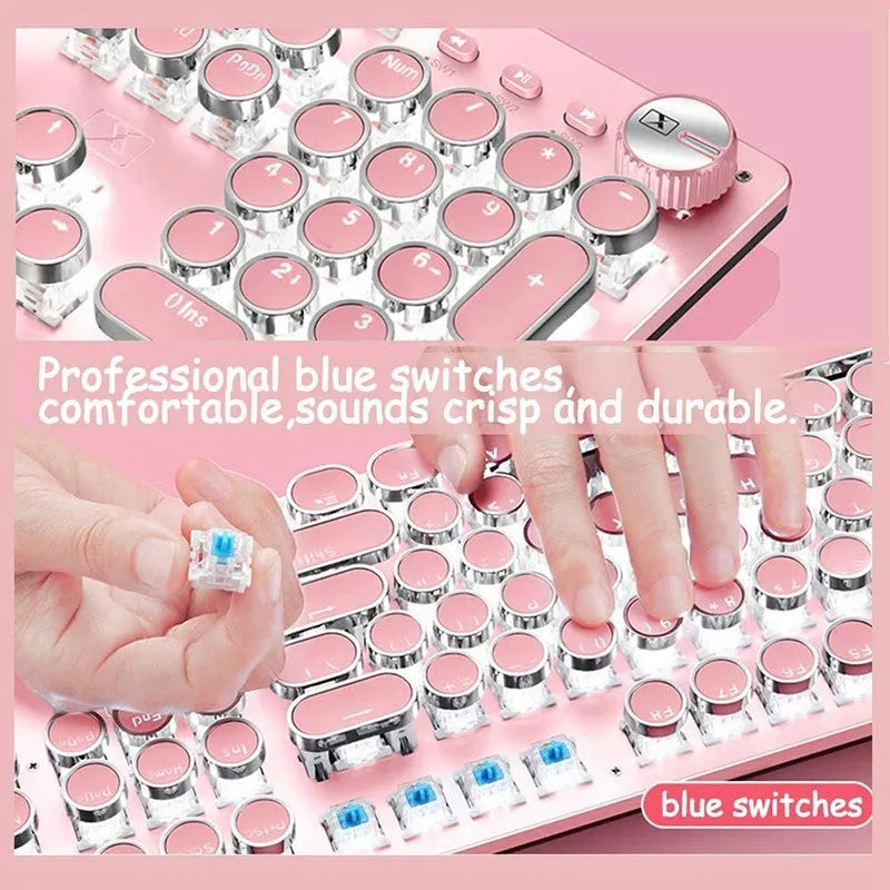 Silver mechanical keyboard with pink accents, green switches, and white LED backlighting