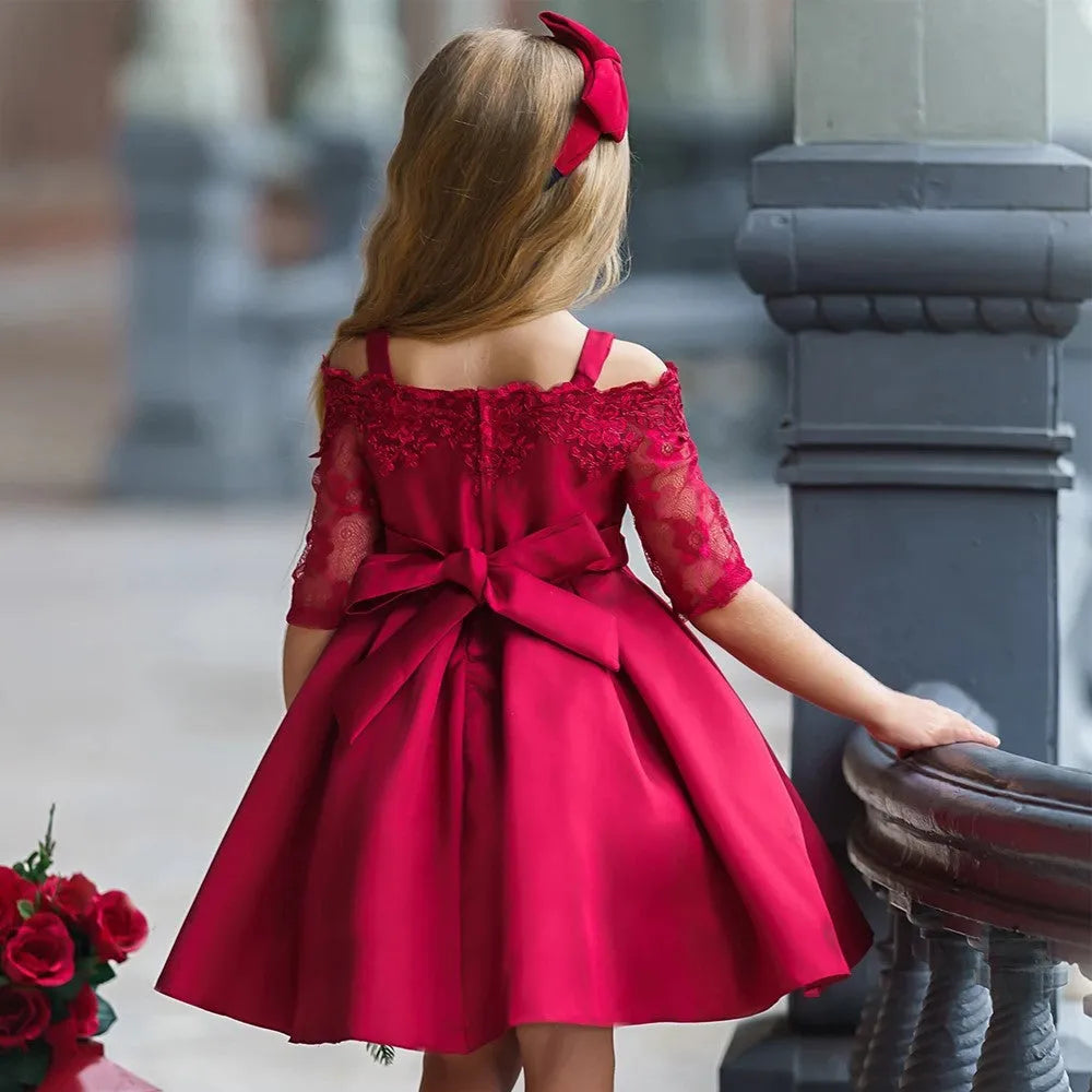 Girls' lace-trimmed dress in colours red, pink, green, white, or dark red.