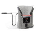 Grey portable car baby bottle warmer with dual slots and digital temperature display screen connected to 12V charger