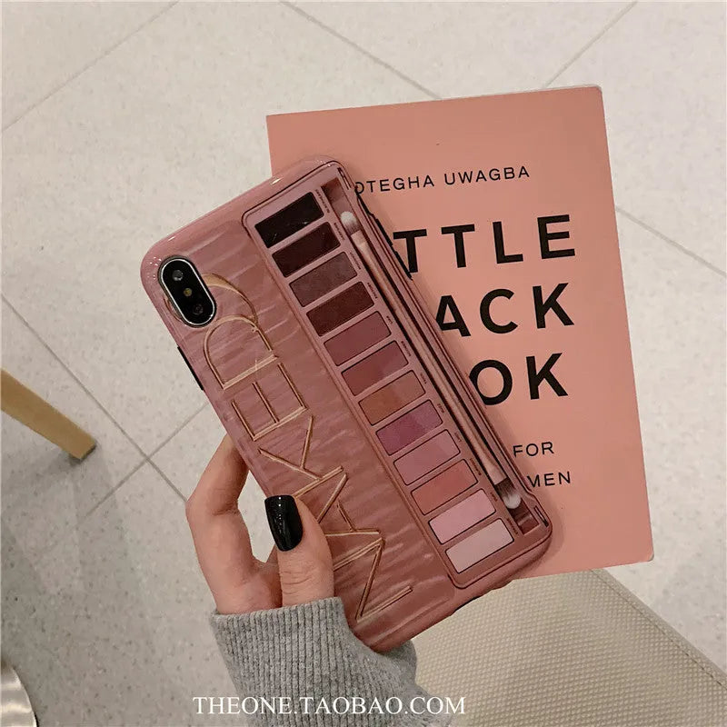 Silicone iPhone case with printed eye shadow colour palette design in flesh colour.