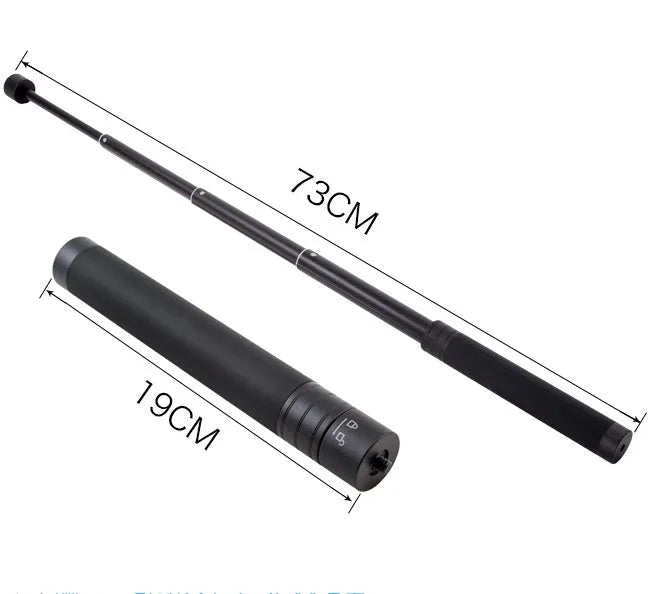 Black retractable aluminium selfie stick with hand-held stabiliser grip holding a smartphone.