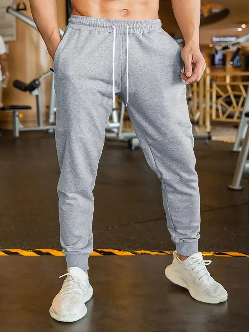 Men's loose-fit linen trousers with 3D pattern design and elastic lace waist with drawstring closure