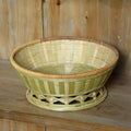 Handmade woven bamboo storage basket in three different sizes for household organisation