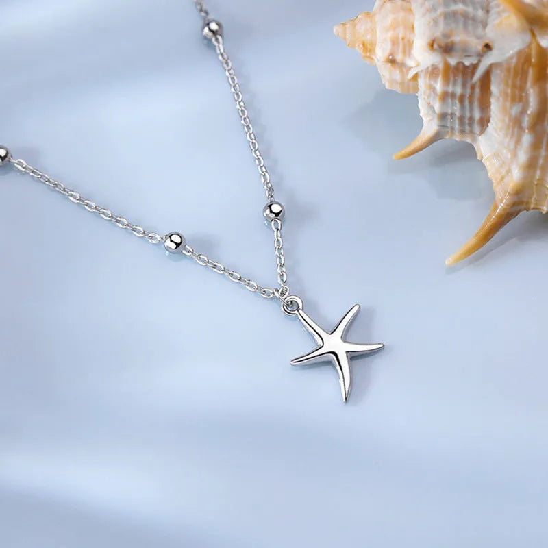 Sterling silver anklet with starfish charm and adjustable chain with lobster clasp