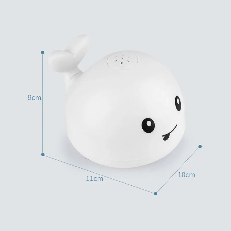 Automatic electric whale bath toy spraying water with flashing coloured lights