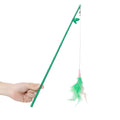 Green interactive cat wand toy with feathers and a bell on a durable plastic handle.