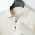 Men's grey wool pullover sweater with a polo collar, laid flat.