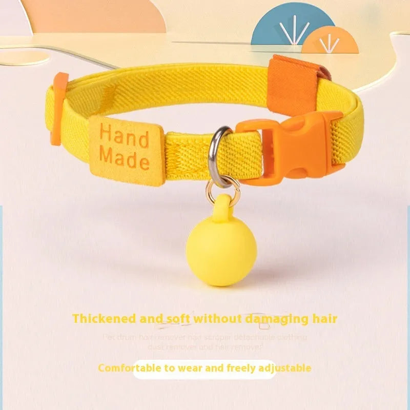 A high-elasticity polyester pet collar for small dogs in a choice of seven solid colours on a white background.