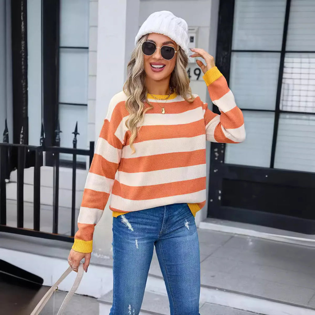 Women's loose striped acrylic sweater in blue with long sleeves and round neck