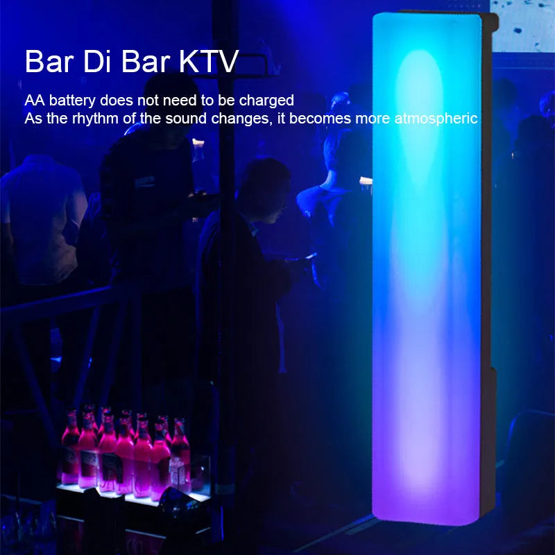3D RGB voice-activated table top ambiance lamp in white or black shell with USB cable.