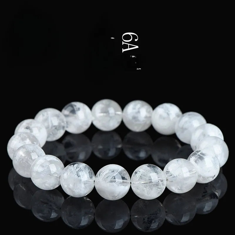 Women's crystal bracelet with natural blizzard snowflake beads featuring Ruyi and Xiangyun Chinese symbols