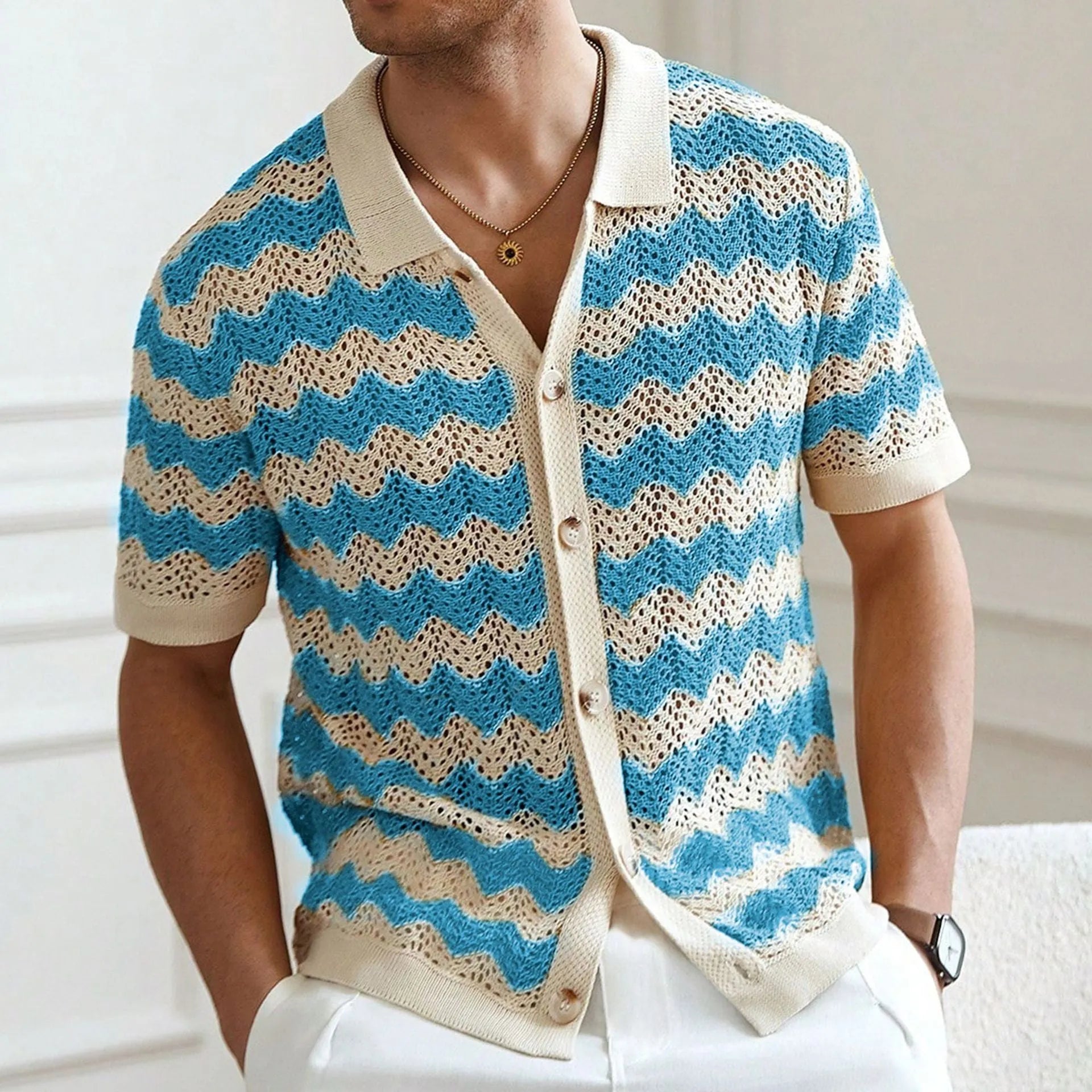 Men's blue short-sleeve sweater with a textured hollow jacquard corrugated pattern.