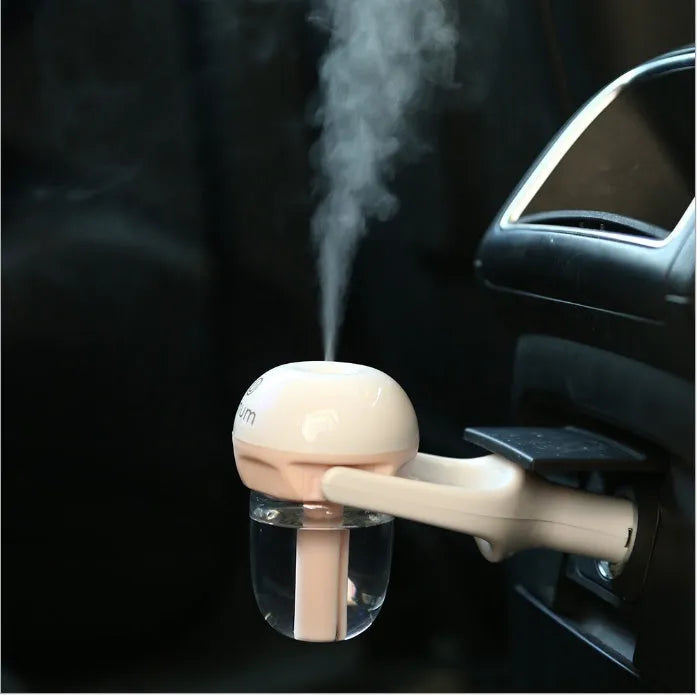 Portable car humidifier with air purifier functions in blue, green, pink or purple colours