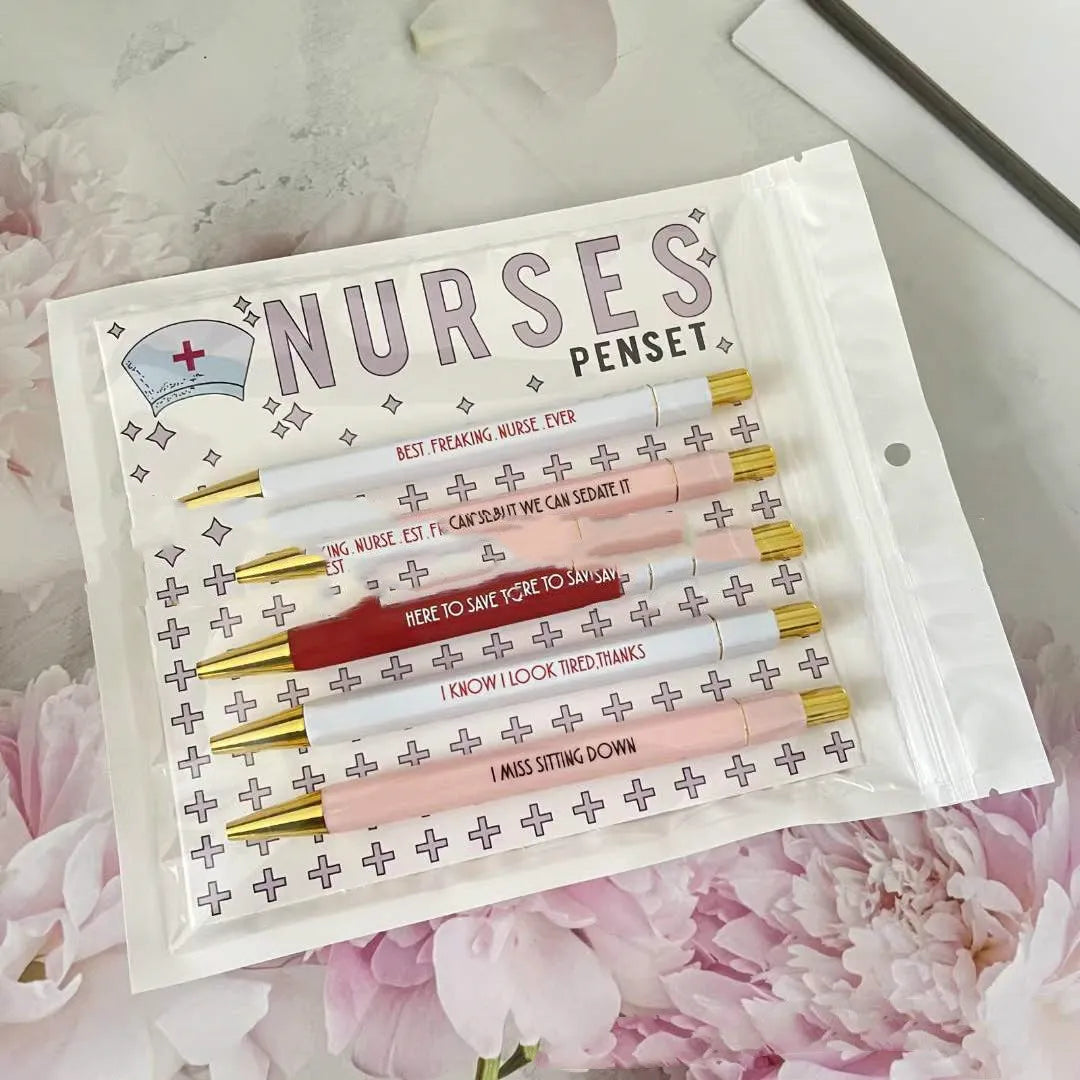Five nurse-themed retractable ballpoint pens showing two refill colour variations