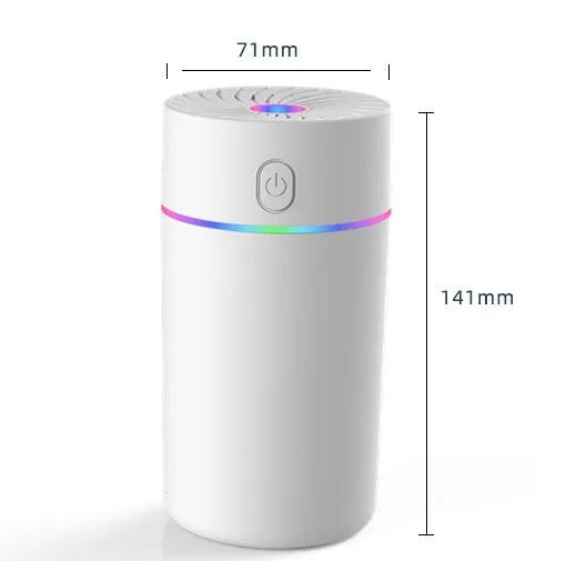 Compact white car USB humidifier with aromatherapy function shown in vehicle cup holder