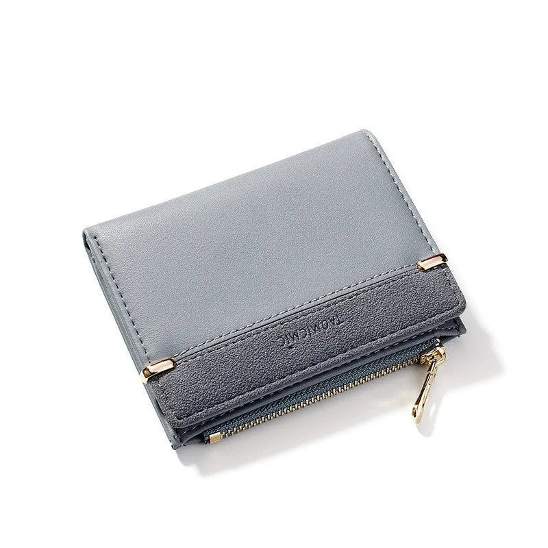 Open view of a ladies PU leather zipper wallet showing multiple card slots, a bill holder, and a change compartment.