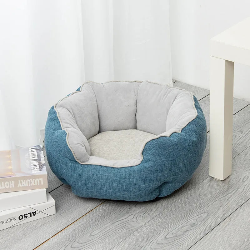 Blue octagonal pet bed with raised sides and removable mats for cats and small dogs