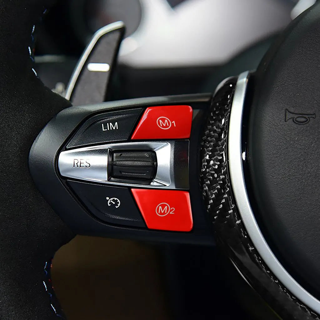 Red and blue BMW steering wheel M1 M2 mode replacement button set with installation keys.