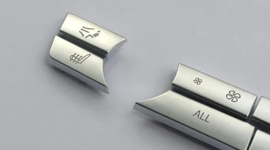 Automotive air conditioning button panel replacement parts showing silver buttons in multiple fitting sizes