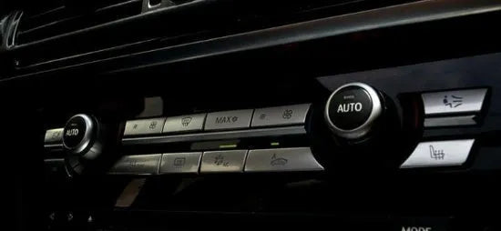 Automotive air conditioning button panel replacement parts showing silver buttons in multiple fitting sizes
