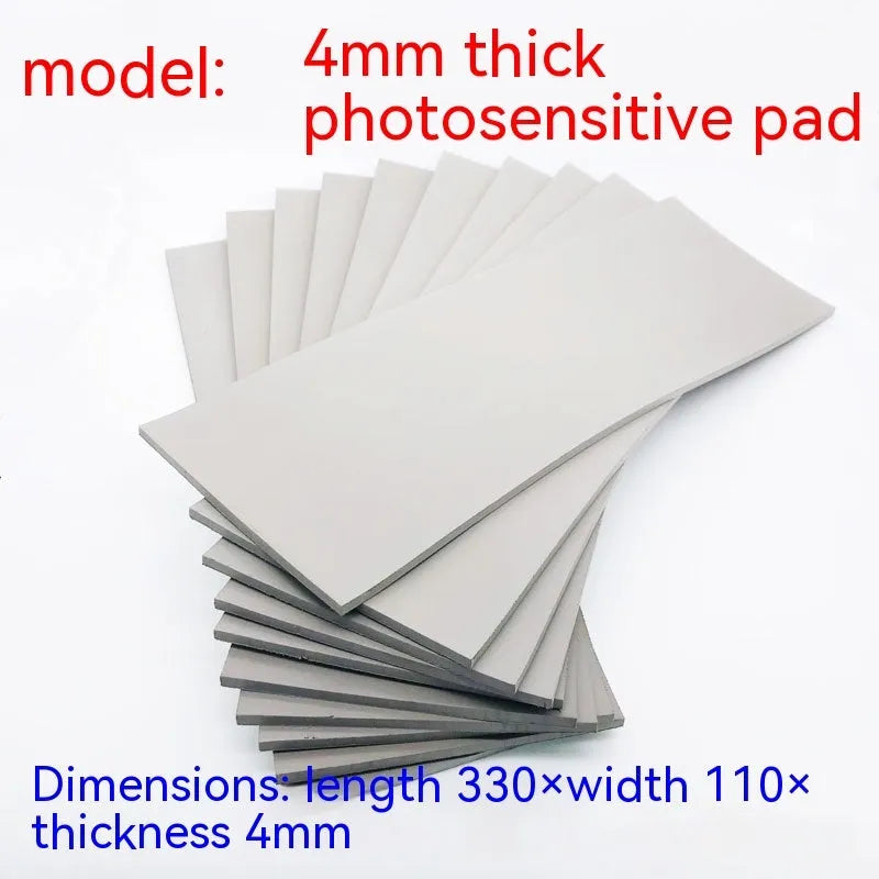 Black and gray plastic light-sensitive mat for seal making measuring 330mm by 110mm